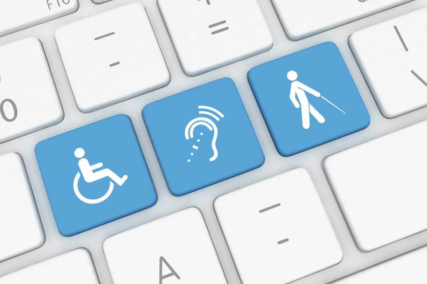 Computer keyboard displaying keyboard keys with accessibility icons