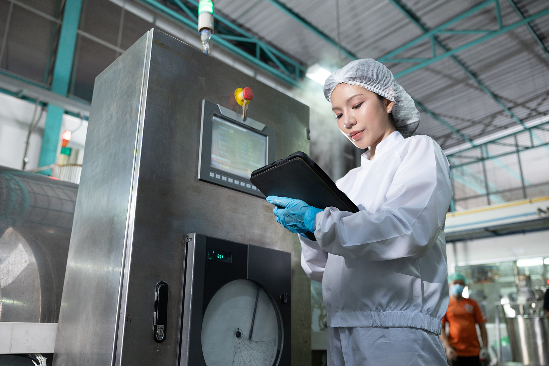 safety inspector on a food production line